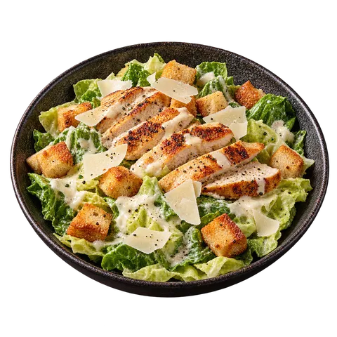 Salade César au poulet grillé, croûtons et copeaux de parmesan